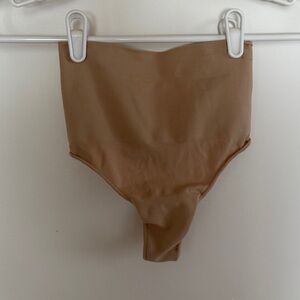SKIMS Tan Control shape wear Thong
